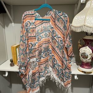 Light weight cover up or cardigan. Southwest patter fly away light.